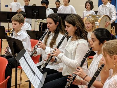 students playing for the band concert
