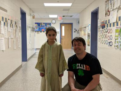 image of student and counselor wearing multicultural clothes