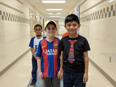 image of students wearing multicultural clothes