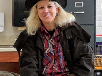 image of teacher, Ms. Owens, dressed as a Pioneer