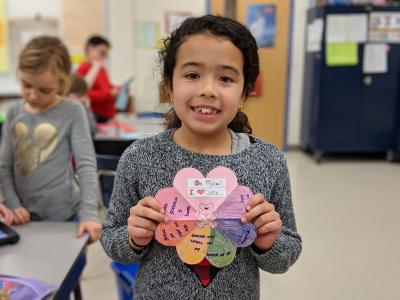 student creating and celebrating valentines day
