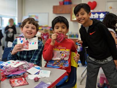 students creating projects for valentine's day