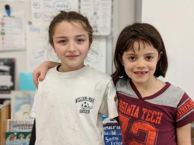 Image of 2 students with jersey
