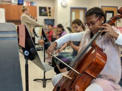 image of student playing an instrument