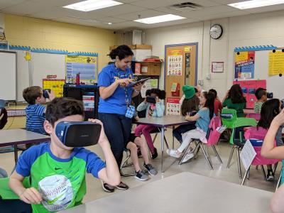 Mrs. Valladares guides her students on a virtual field trip
