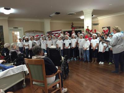 chorus performing for local nursing home